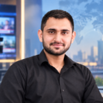 Confident Newsroom Portrait